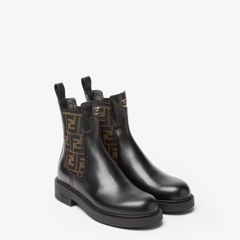 Fendi Filo
Black leather and FF fabric biker boots